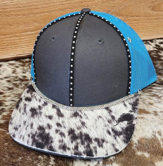 One-of-a-kind blue mesh snapback with cowhide-patterned bill and rhinestone accents